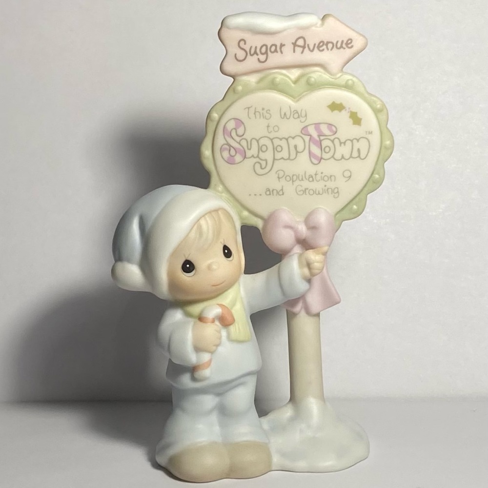 Precious Moments Sugar Town Sam Butcher/Population Sign Figurine